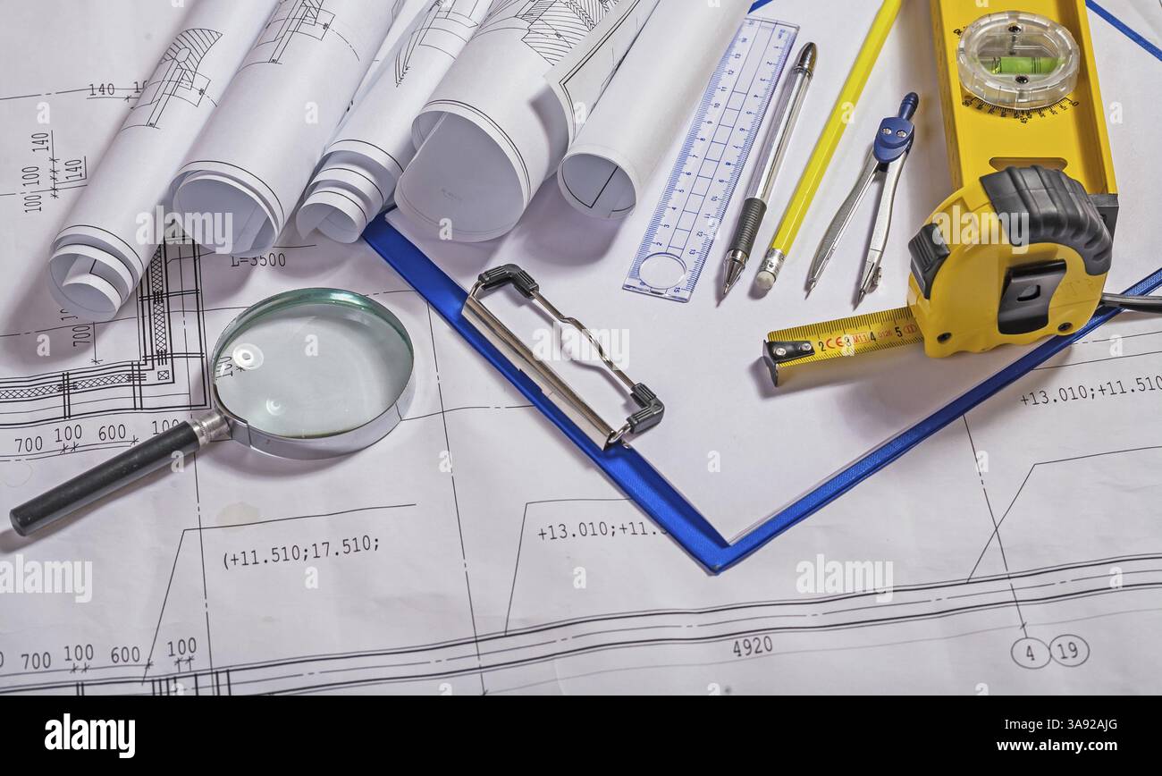 Set of architect tools on blueprint Stock Photo - Alamy