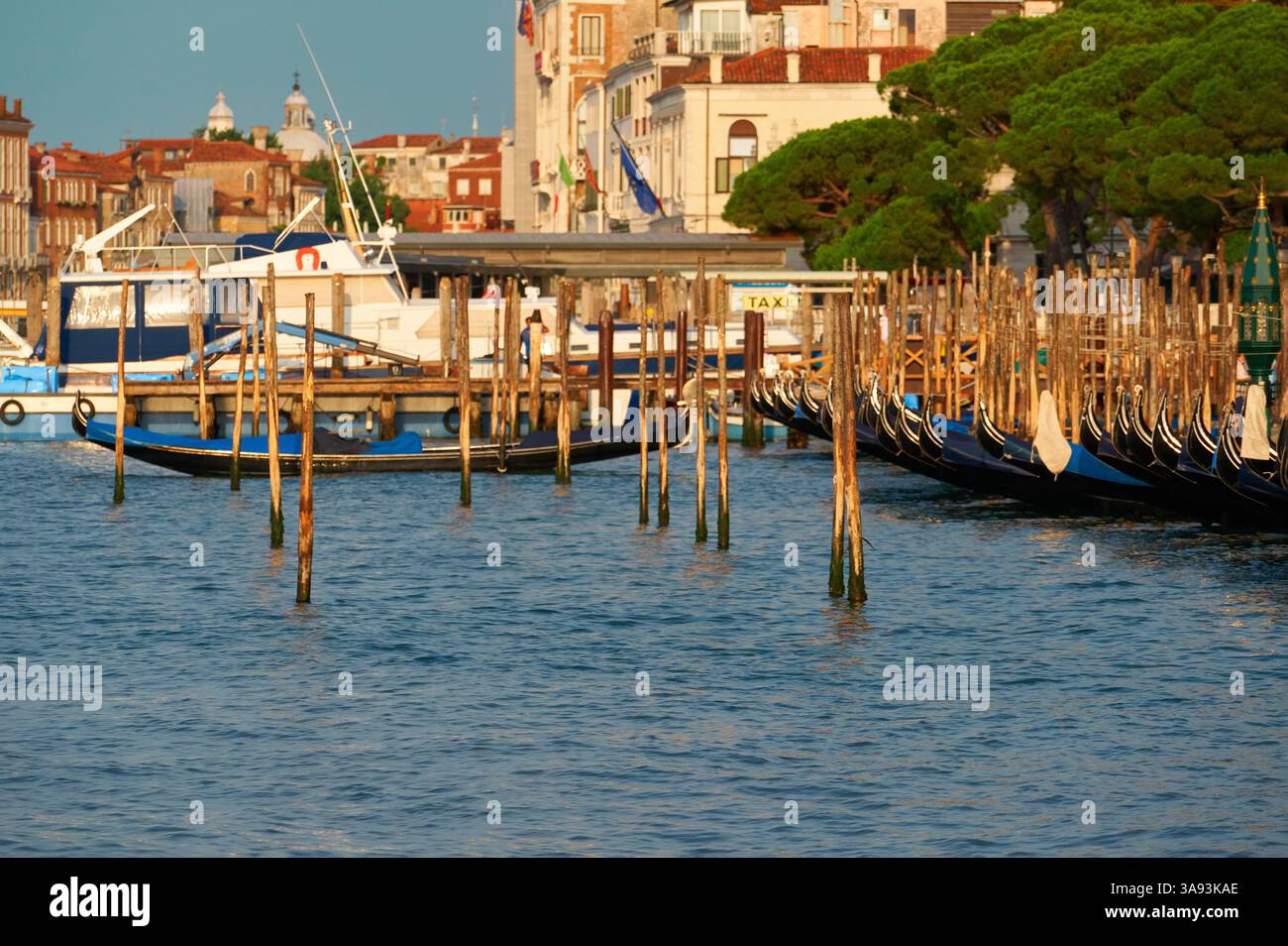 Gondolas on the quay in the lagoon. Venice, Italy Stock Photo - Alamy