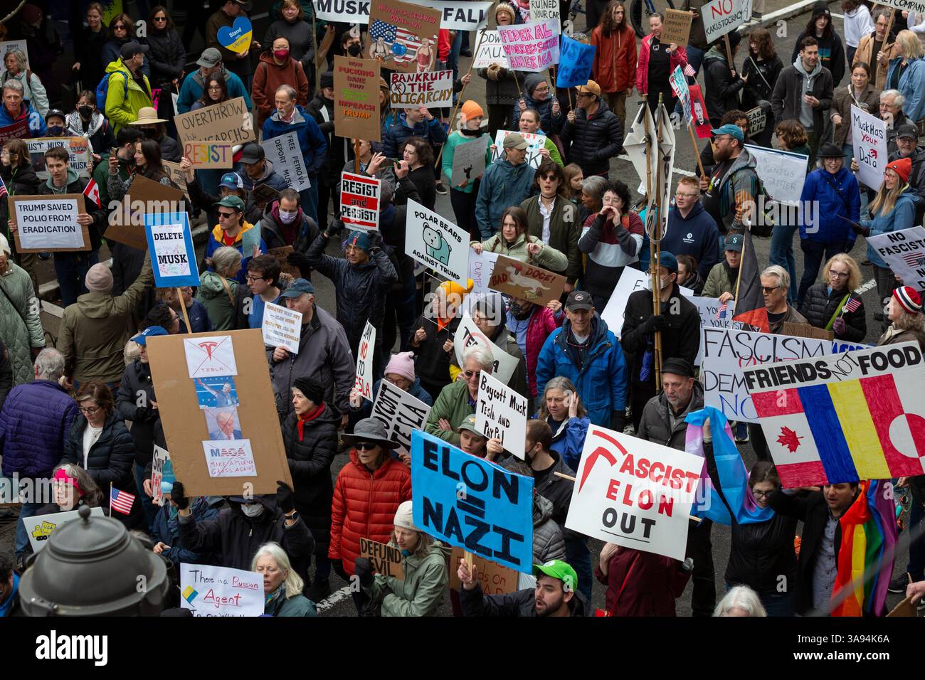 Seattle, Washington, USA. 29th March, 2025. U.S. Representative Pramila Jayapal speaks passionately to protesters during a rally at University Village Tesla. The Tesla Takedown Rally, part of a Global Day of Action, is a protest against Elon Musk and the Donald Trump administration. Credit: Paul Christian Gordon/Alamy Live News Stock Photo