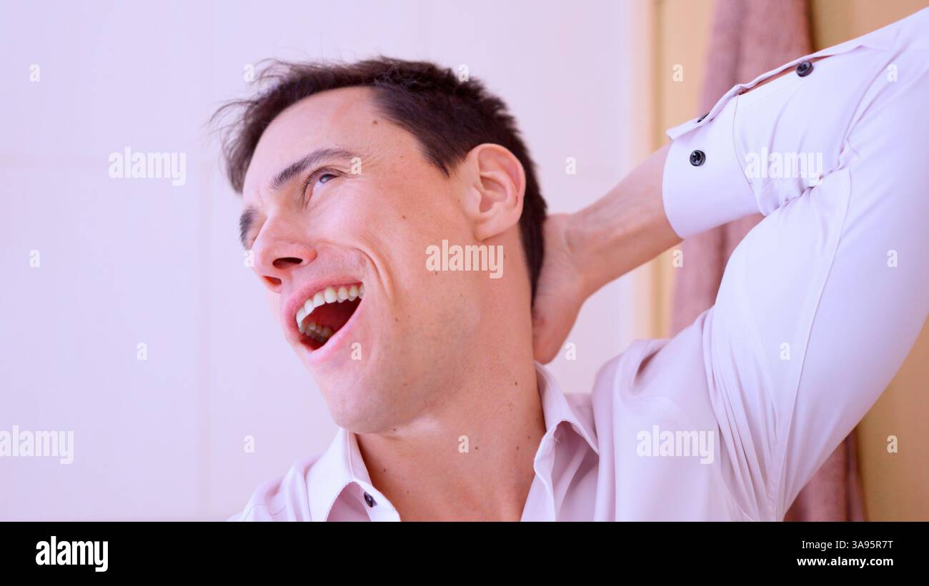 Funny and prankster man making funny face Stock Photo - Alamy
