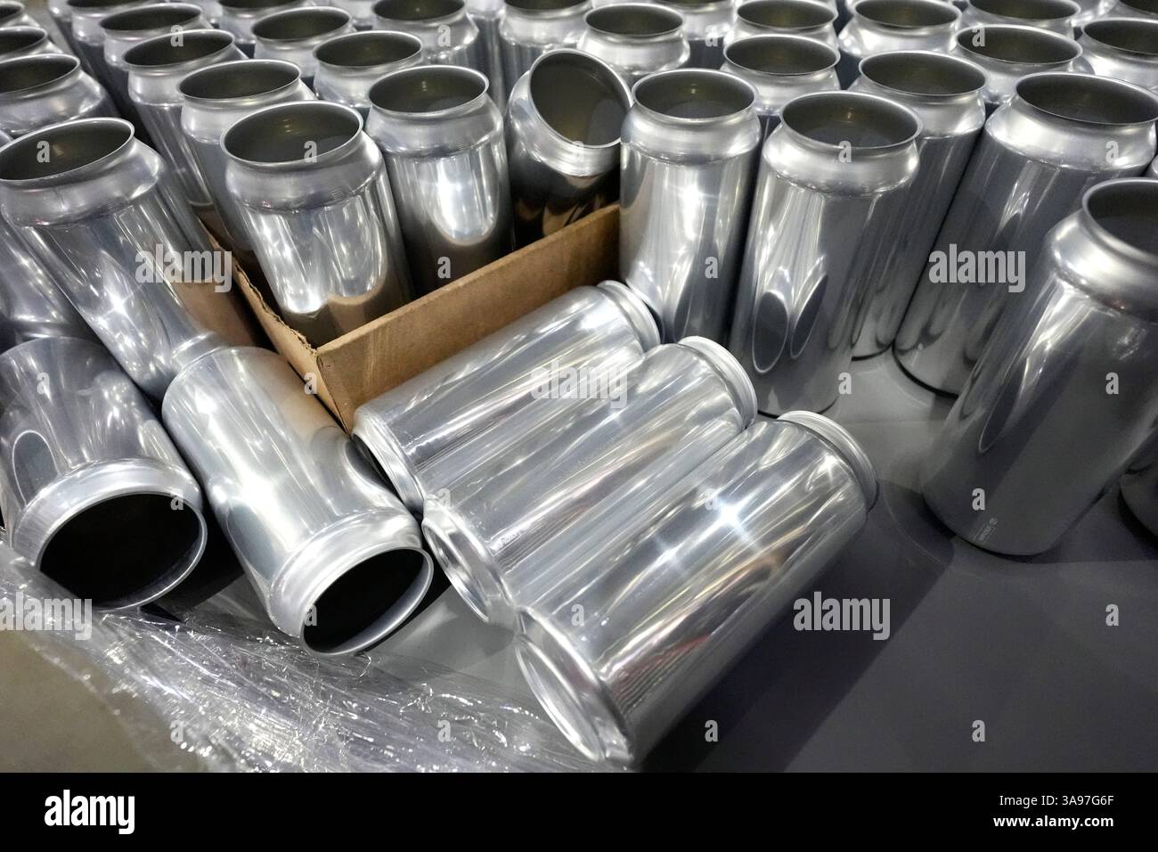 FILE - Empty aluminum cans for beer sit at the old Irving Brewing Co ...
