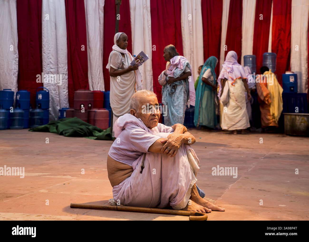 Oct 16, 2017 - Vrindavan, Uttar Pradesh, India - A widow along with others who are cast out by their families enjoying Diwali, the national festival of India to be held this weekend at Vrindavan, in the state of Uttar Pradesh, about 185 kilometer away from the national capital Delhi. Around 65000 widows live there in various Old Age Homes, commonly known as ‘Ashrams’ in this small spiritual city and they are spending many years alone without affection of their relatives. Diwali festival, also the festival of lights will be celebrated by Indians on October 19 worldwide. (Credit Image: © Sauvik Stock Photo
