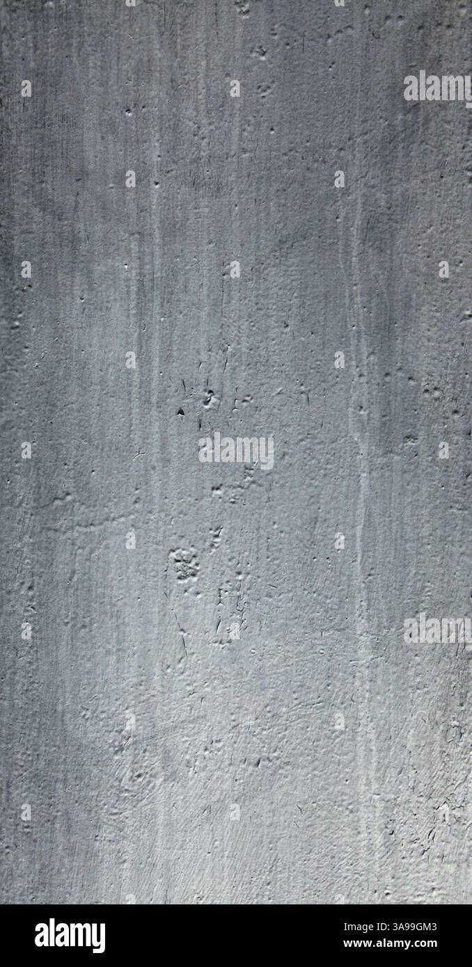 Metallic wall background, texture. Grey or dark-gray roughly painted surface. Old and faded wall and fence sketches. Dark, dingy and gloomy colors Stock Photo