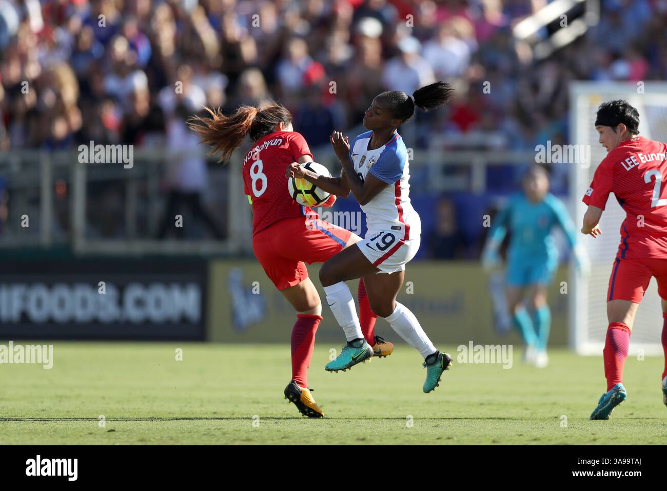 October 22, 2017 - Cary, NC, USA - Cary, NC - Sunday October 22, 2017: Crystal Dunn and Cho Sohyun during an International friendly match between the Women's National teams of the United States (USA) and South Korea (KOR) at Sahlen's Stadium at WakeMed Soccer Park. The U.S. won the game 6-0. (Credit Image: © Andy Mead/ISIPhotos via ZUMA Wire) Stock Photo