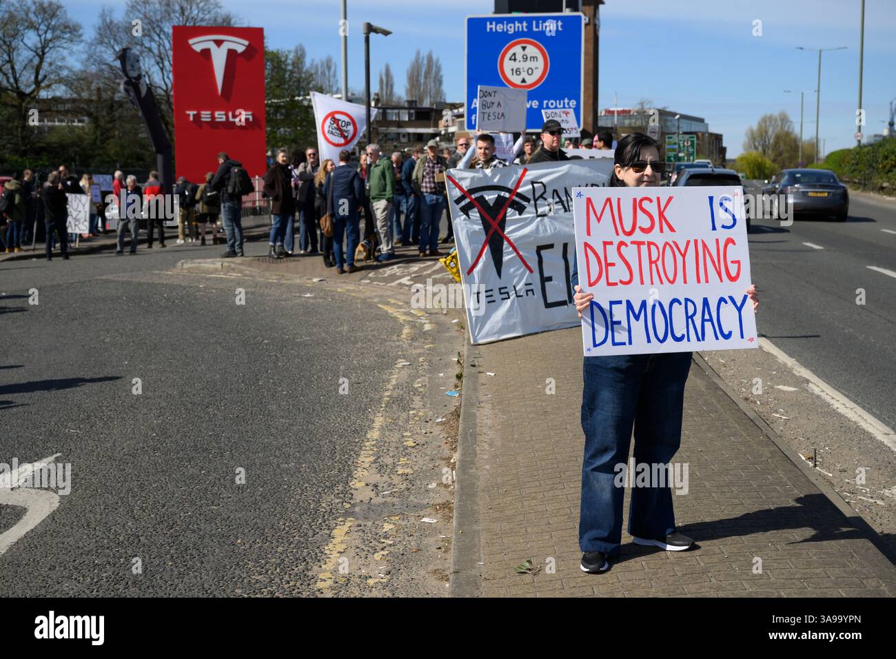 Anti-Elon Musk protesters demonstrated outside the Tesla showroom in ...