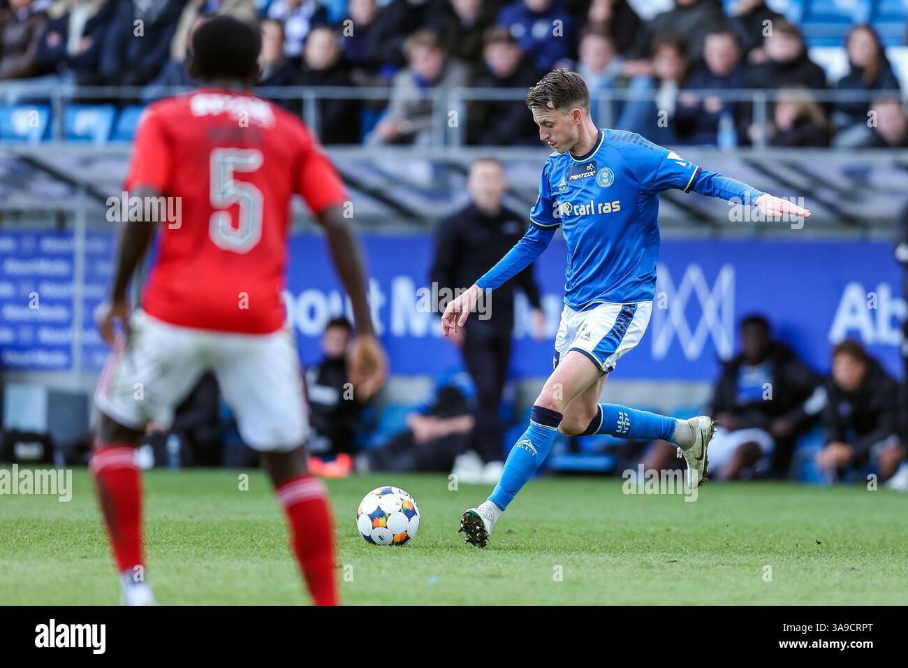Th Rasmussen Lyngby, Denmark. 30th Mar, 2025. Mathias Hebo Rasmussen (8) of Lyngby ...