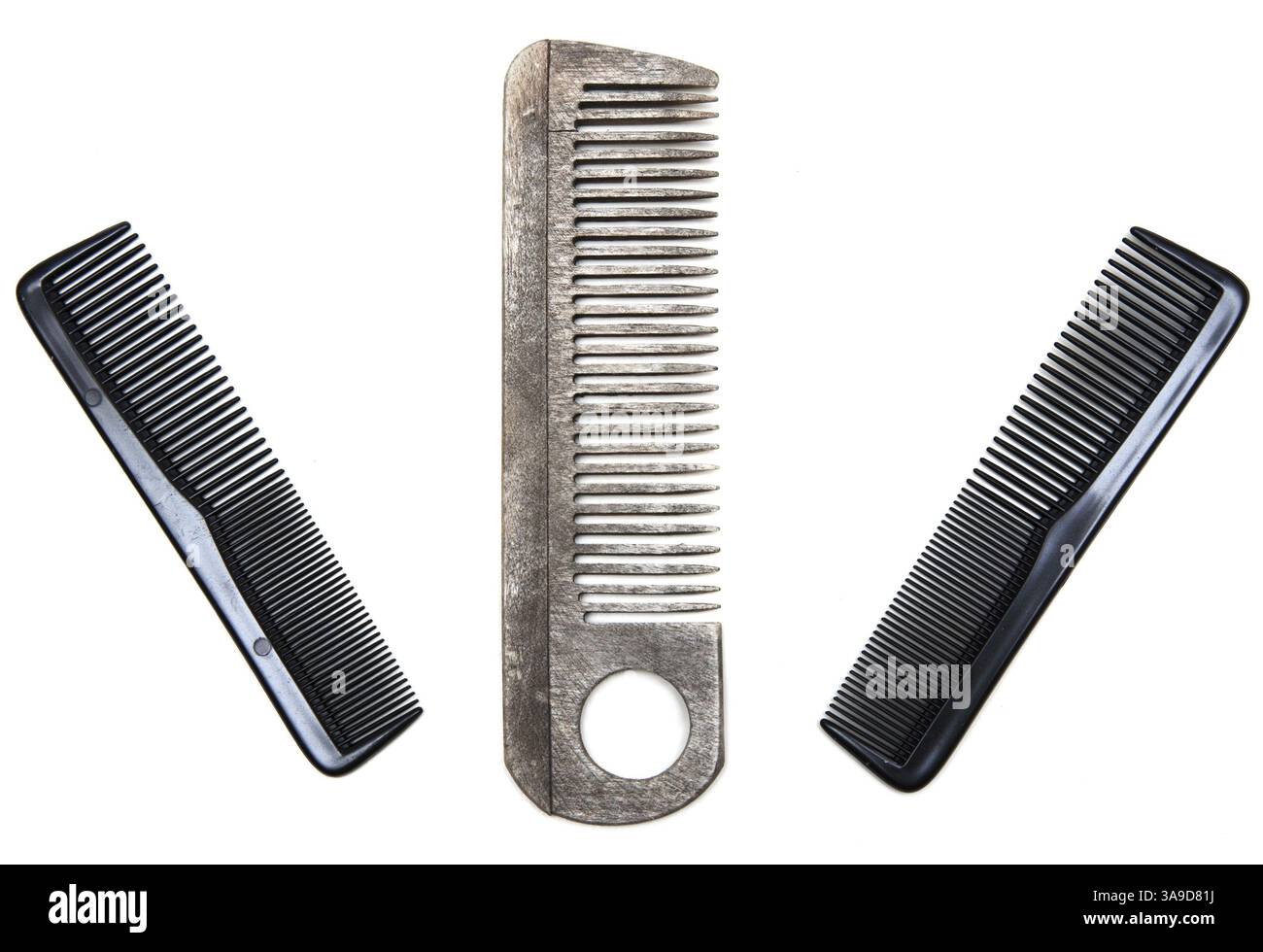 Three plastic combs insulated on white background Stock Photo