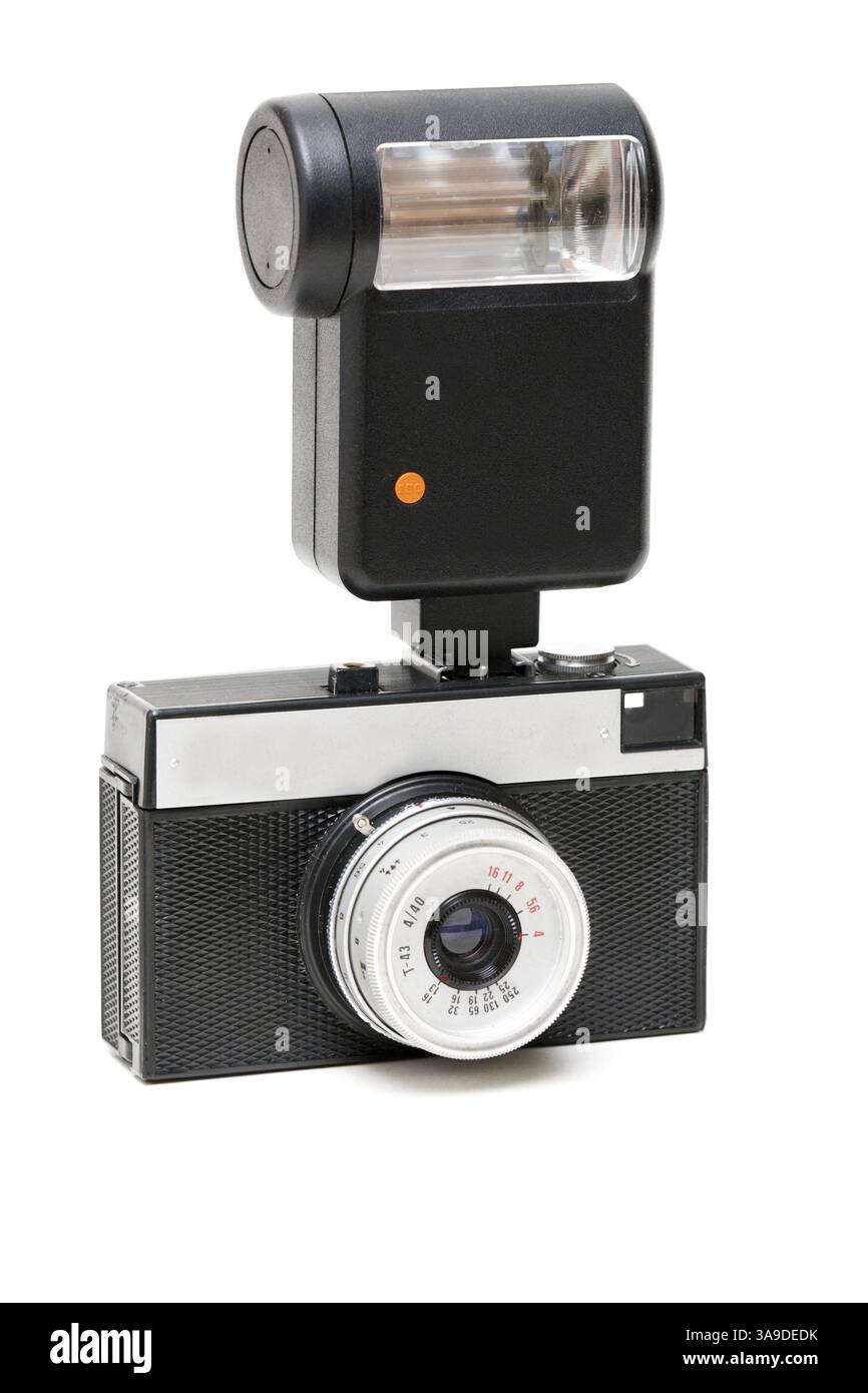 Old camera with a flash Isolated on white background Stock Photo