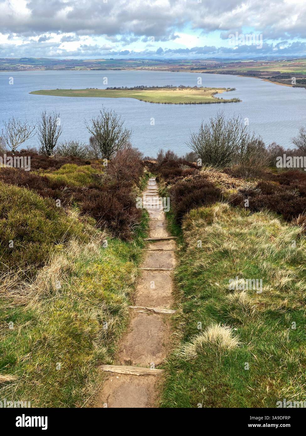View of RSPB Loch Leven National Nature Reserve and St. Serfs island from Vane Hill on one of the walking trails, Kinross Scotland - Smartphone Captured Stock Image