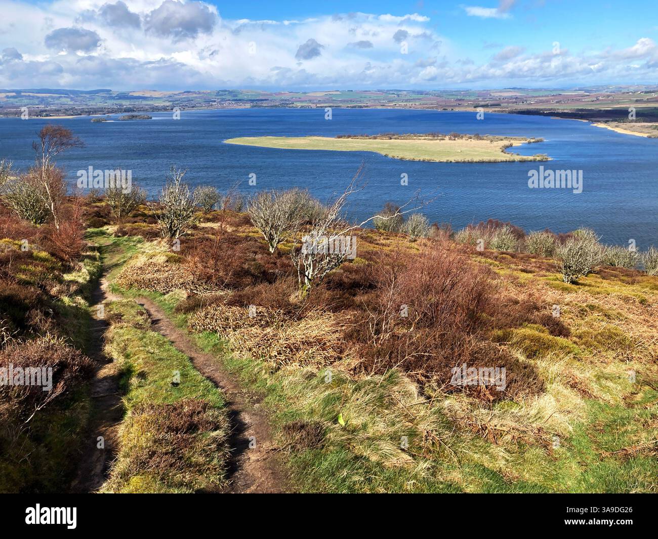 View of RSPB Loch Leven National Nature Reserve and St. Serfs island from Vane Hill on one of the walking trails, Kinross Scotland - Smartphone Captured Stock Image