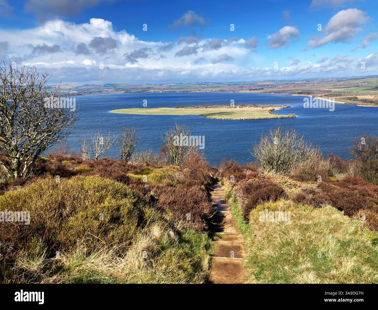 View of RSPB Loch Leven National Nature Reserve and St. Serfs island from Vane Hill on one of the walking trails, Kinross Scotland - Smartphone Captured Stock Image