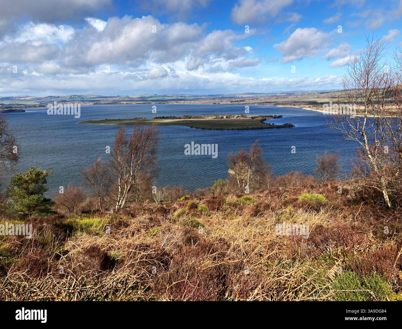 View of RSPB Loch Leven National Nature Reserve and St. Serfs island from Vane Hill on one of the walking trails, Kinross Scotland - Smartphone Captured Stock Image