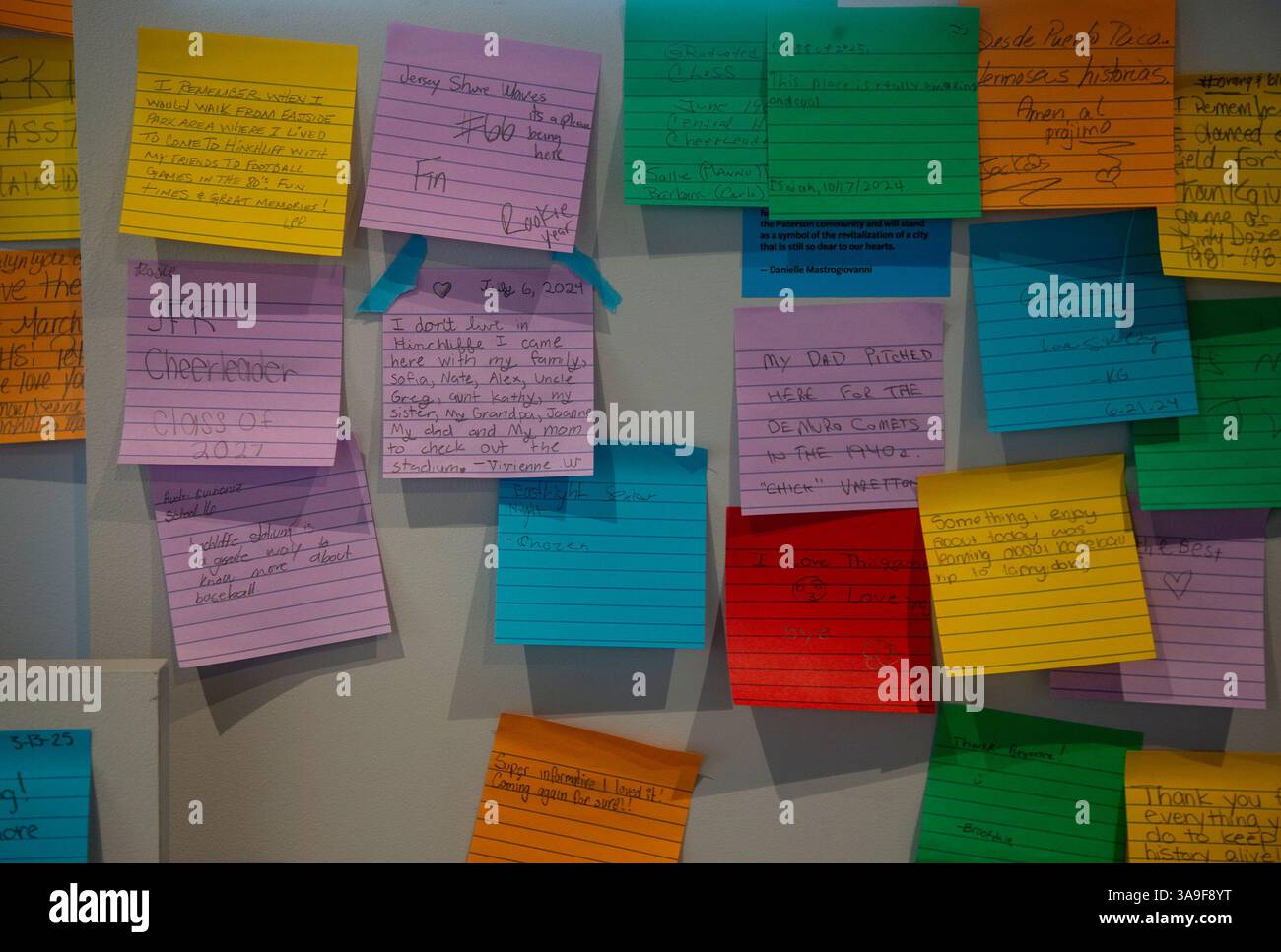 Adhesive notes on a bulletin board Stock Photo