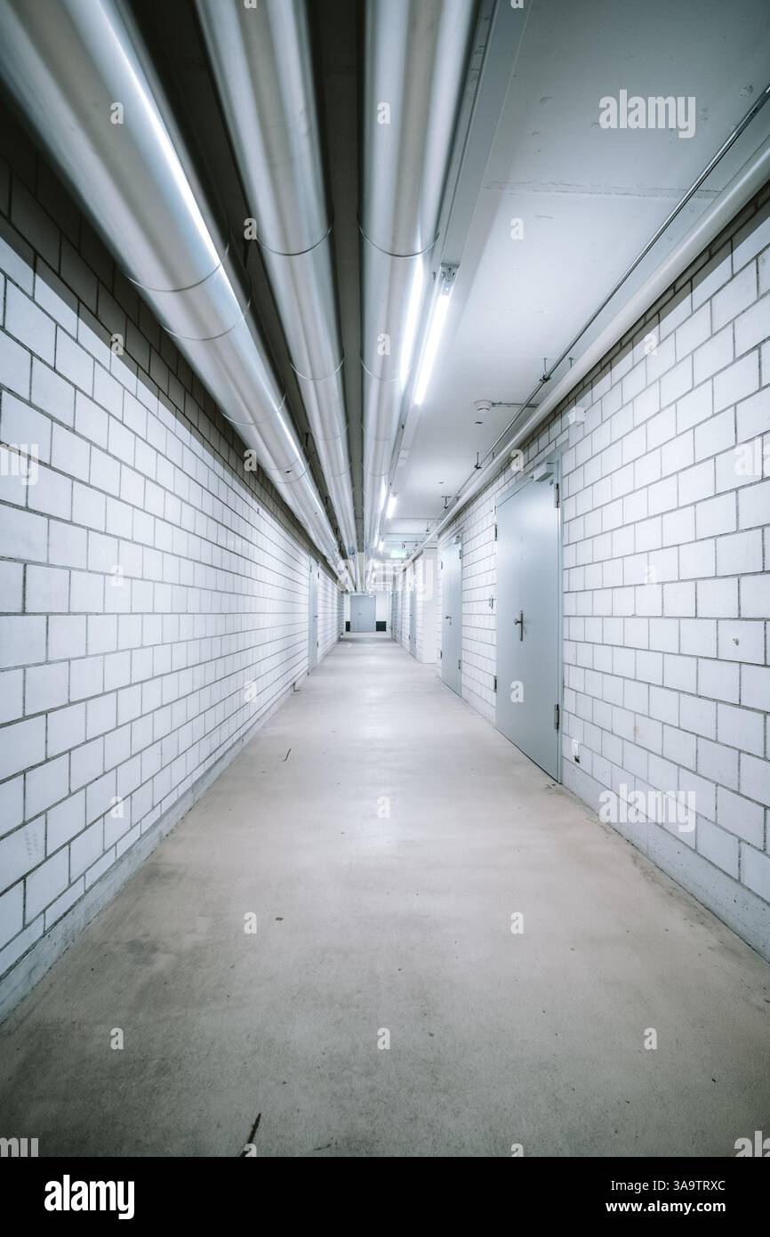 thick-metal-ceiling-mounted-air-conditioning-pipes-inside-underground