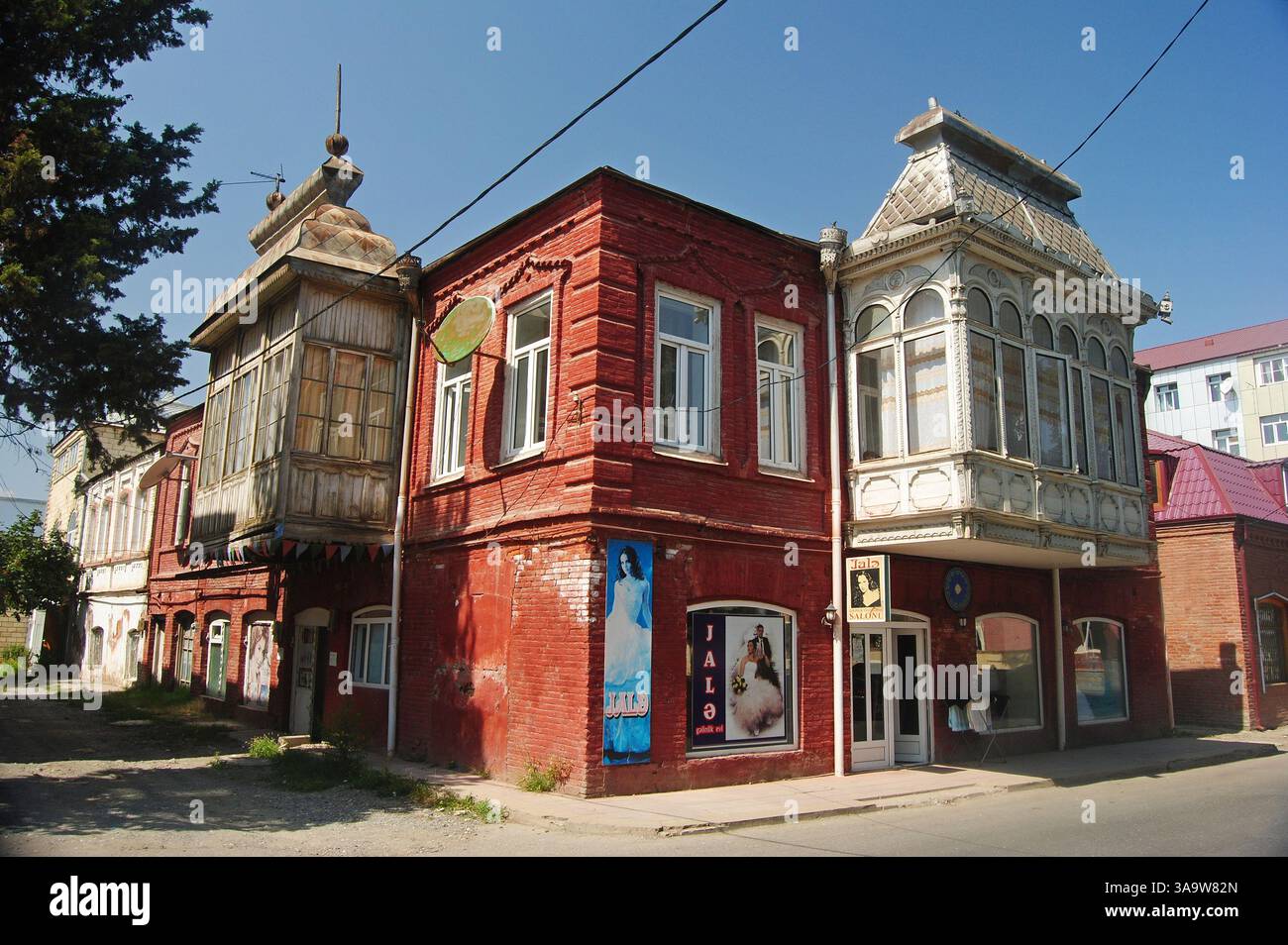 Quba, Azerbaijan – August 23, 2014. Typical 19th-century house in central Quba. View with commercial properties. Stock Photo
