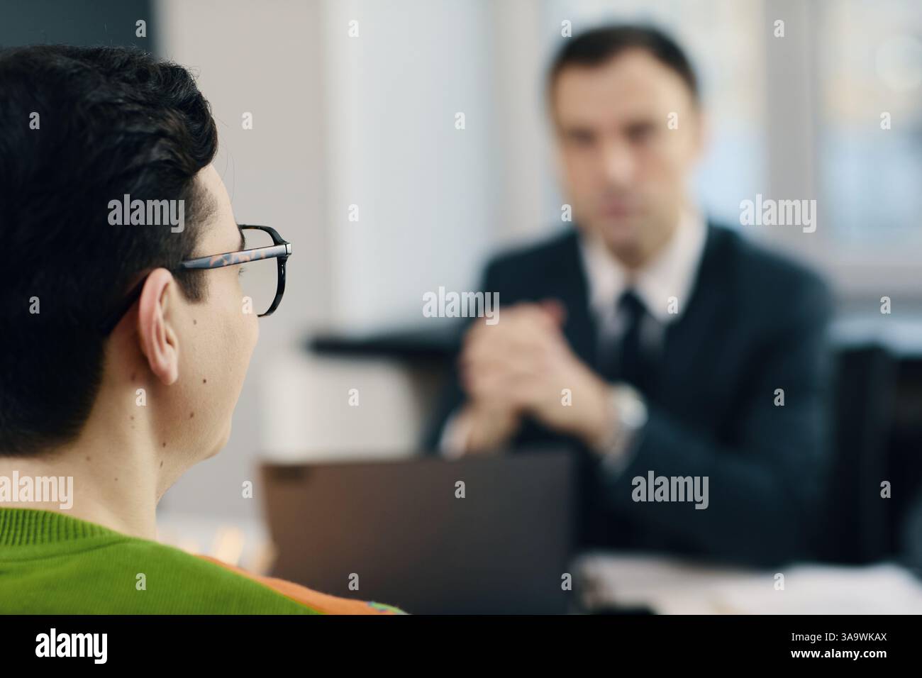 Young Employee Having Interview In Office Stock Photo - Alamy