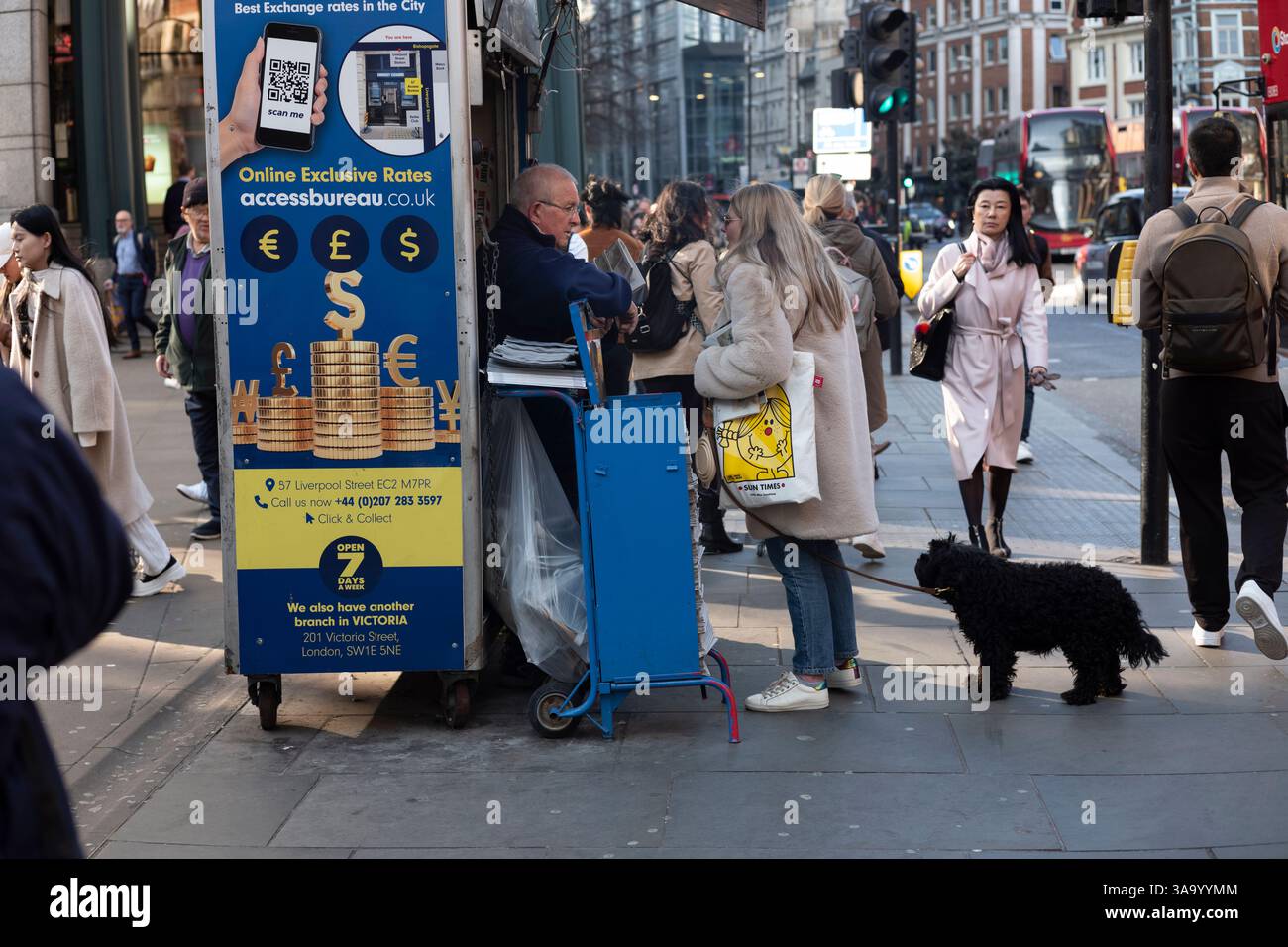 An Evening Standard weekly publication distribution stand for free pick-up across London, outside Liverpool Street Station, City of London, England. Stock Photo