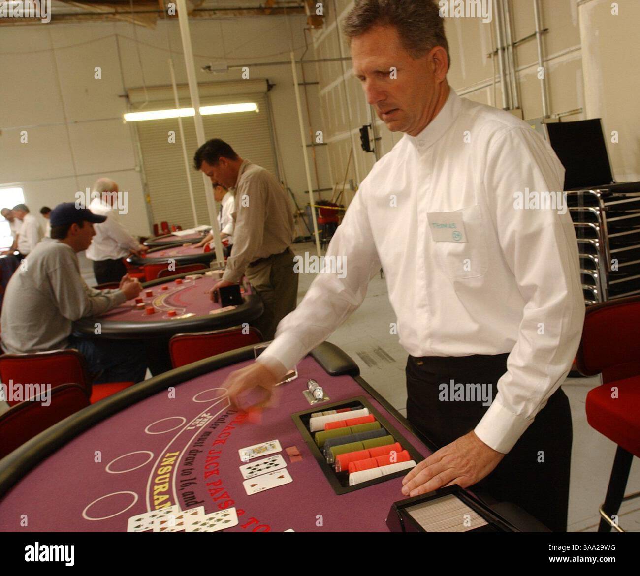--  Saturday, March 15, 2003, Rocklin, Calif. --  Thomas Dean, a student at Thunder Valley Casino Dealer School plays a game of Black Jack by himself as he continues to prepare himself for his future job.  ( The Sacramento Bee Hector Amezcua )/ZUMA Press Stock Photo