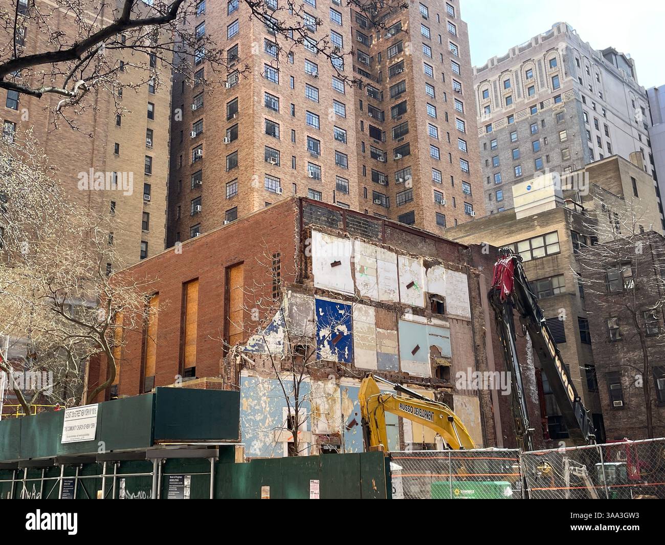 Colorful panels at a demolition site in Murray Hill historic District, 2025, New York City, USA - Smartphone Captured Stock Image