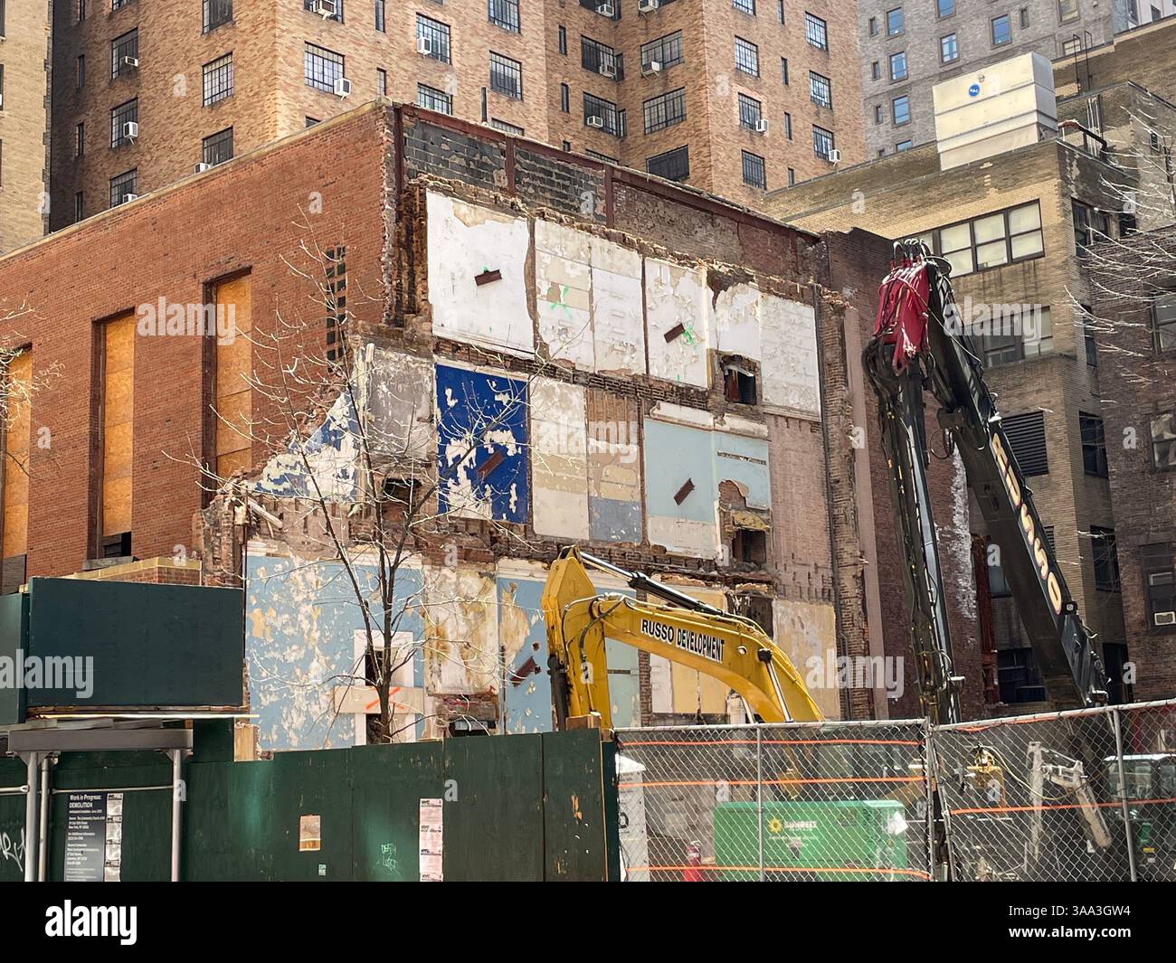 Colorful panels at a demolition site in Murray Hill historic District, 2025, New York City, USA - Smartphone Captured Stock Image