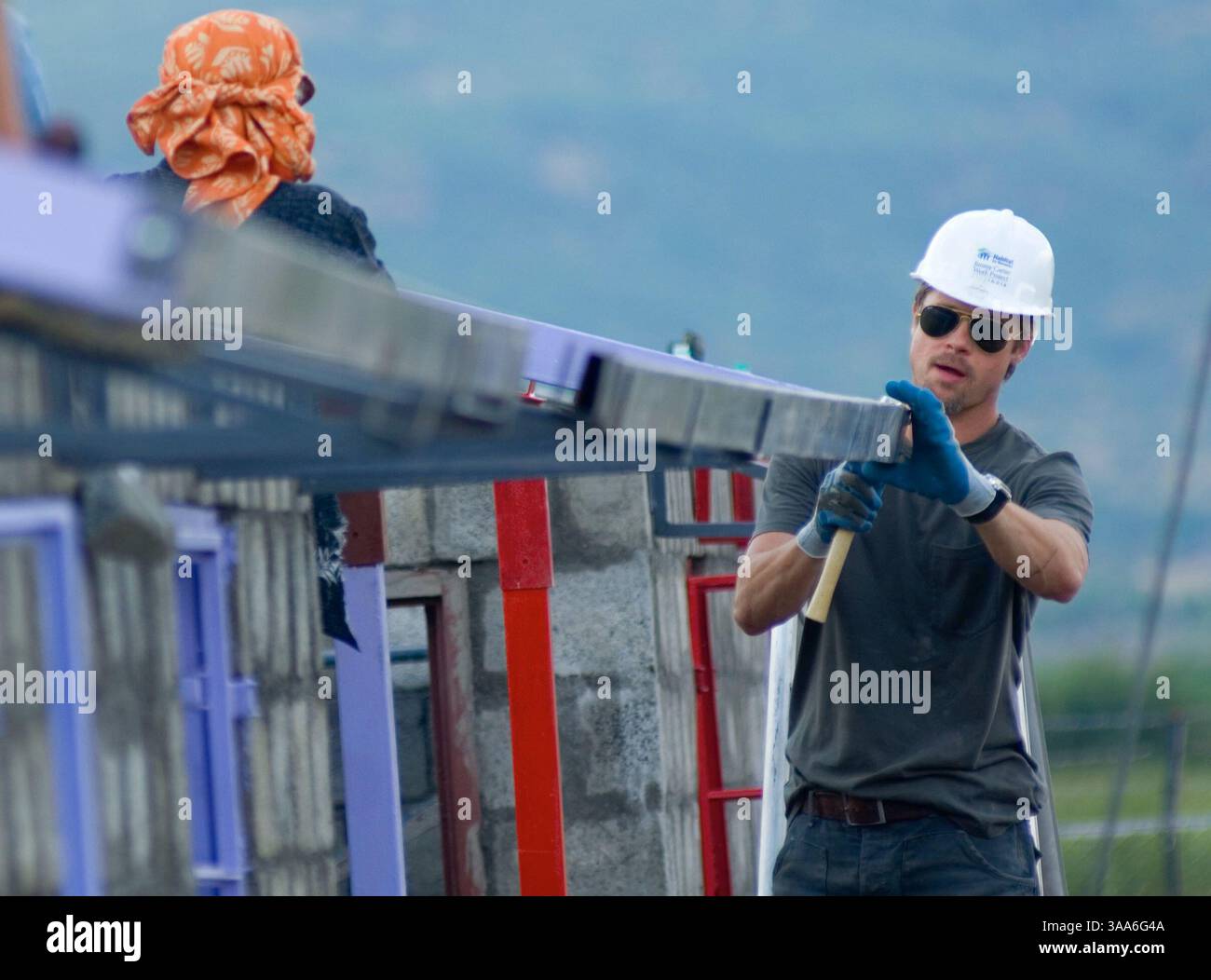 Nov 01, 2006; Lonavla, INDIA; BRAD PITT lends a hand to the Habitat for