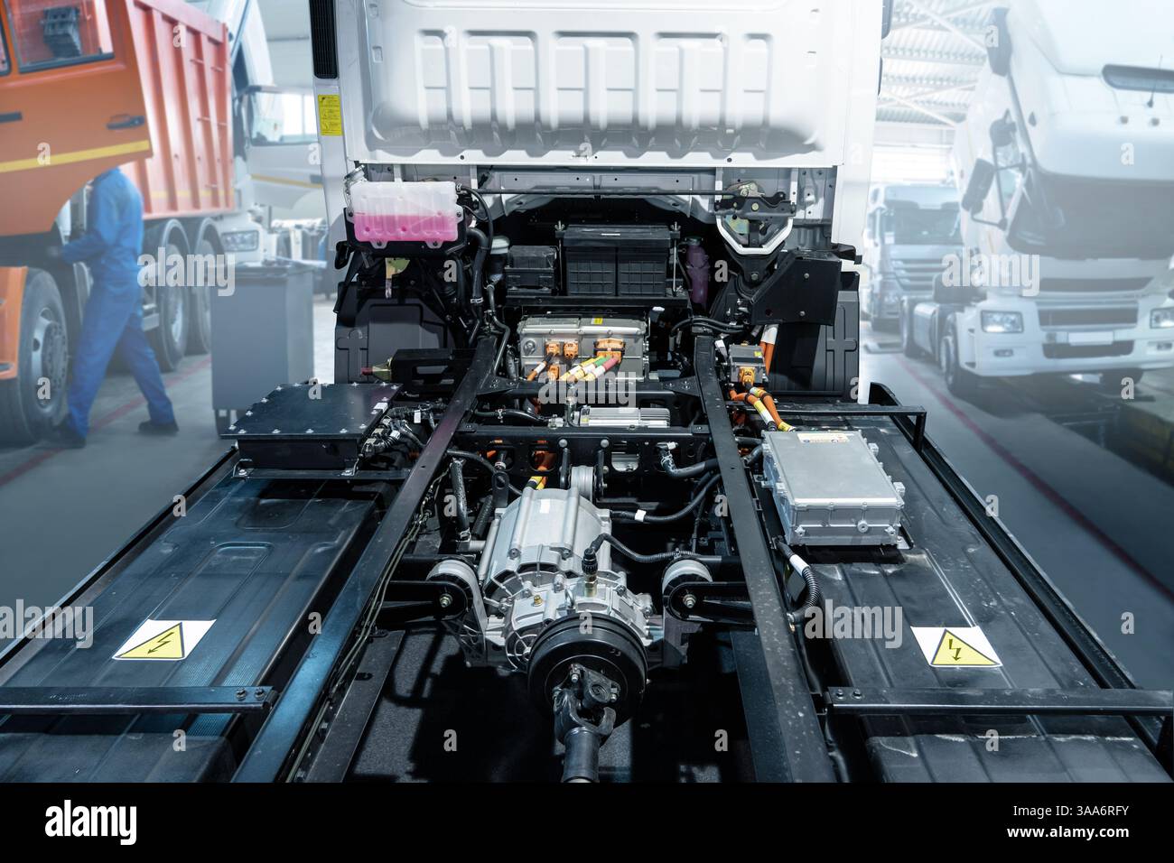 Electric truck in car service. Electric vehicles maintenance. Stock Photo