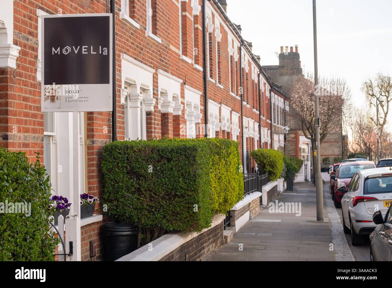 Sw12 Area LONDON- MARCH 31, 2025: Estate agent Sold sign outside residential ...