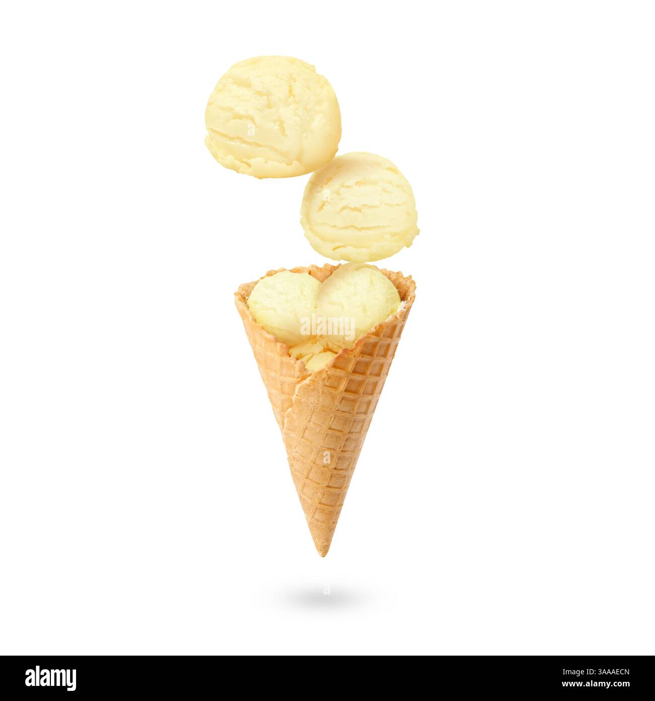 Ice cream scoops and waffle cone in air on white background Stock Photo ...