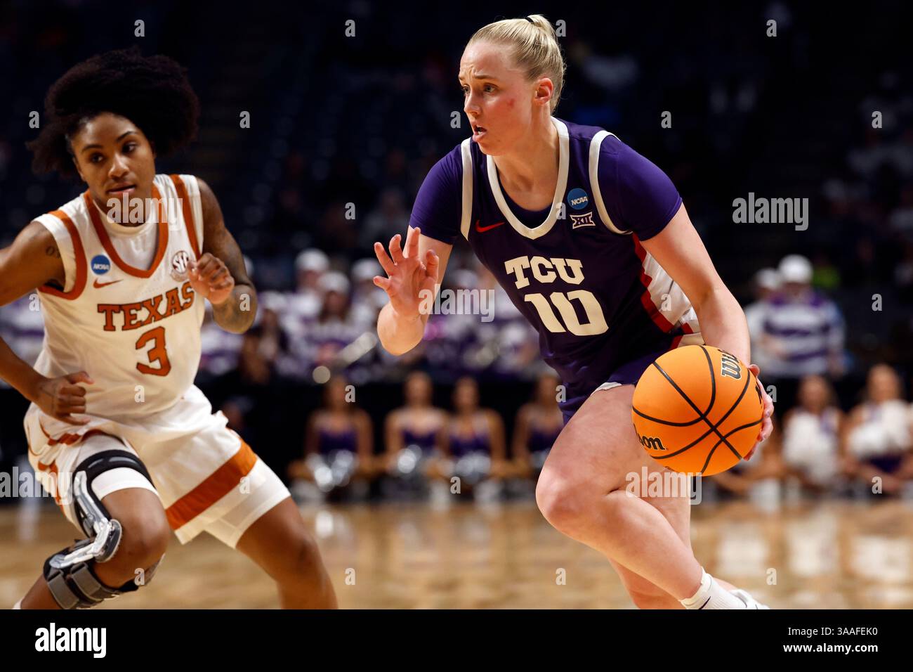 Hailey Guard TCU guard Hailey Van Lith (10) drives to the basket around Texas guard ...