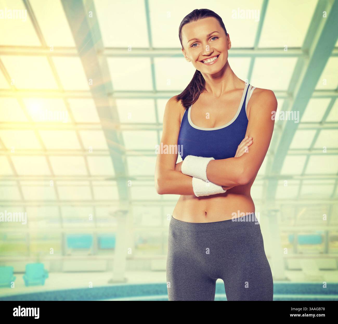 Smiling athlete stands arms hi-res stock photography and images - Alamy