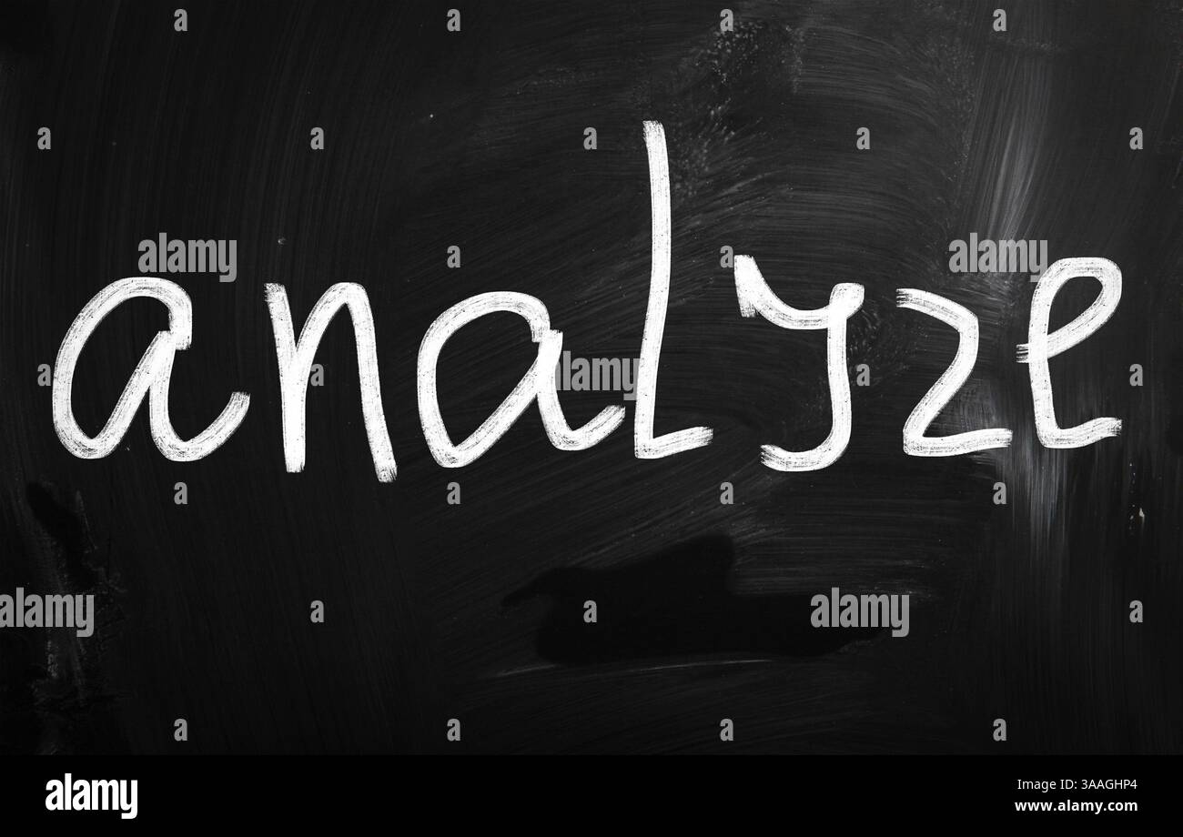Analyze handwritten with white chalk on a blackboard Stock Photo