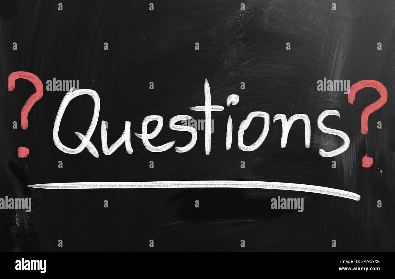 Question, handwritten with white chalk on a blackboard Stock Photo
