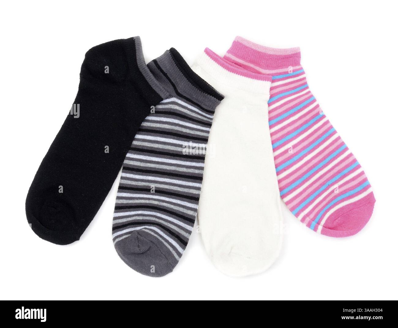Four colored striped socks isolated on white background Stock Photo