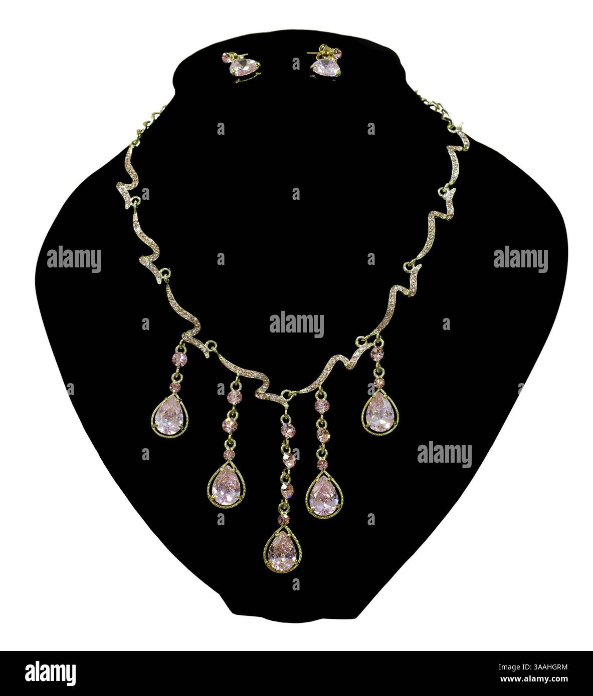 A necklace with tear shaped pendants of pink glass and earrings Stock Photo
