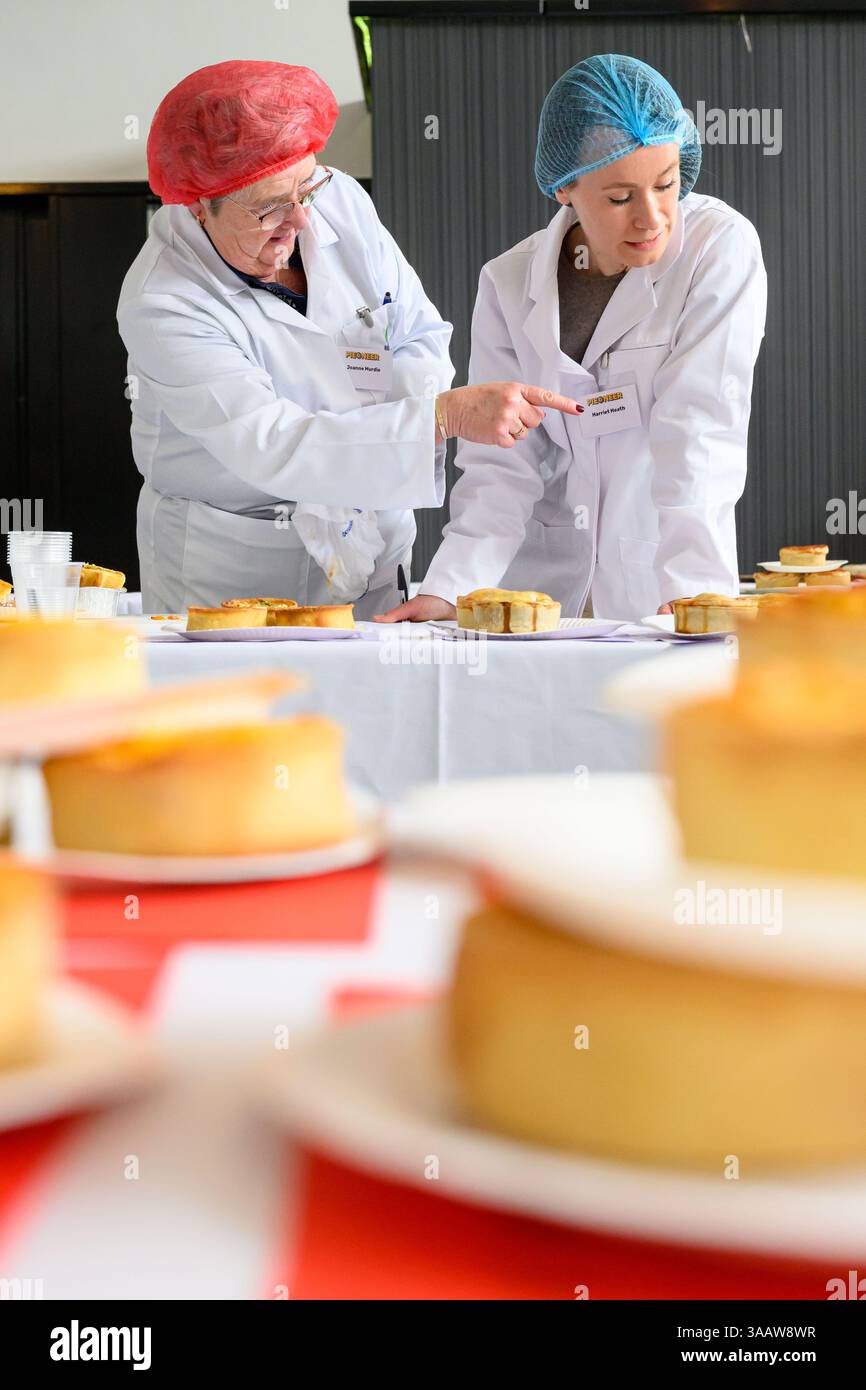 PIEONEERS BATTLE IT OUT FOR RECORD-BREAKING PIE-OFF AT 25TH ANNUAL WORLD CHAMPIONSHIP SCOTCH PIE AWARDS  Over 530 pies compete for crowning glory – bi Stock Photo