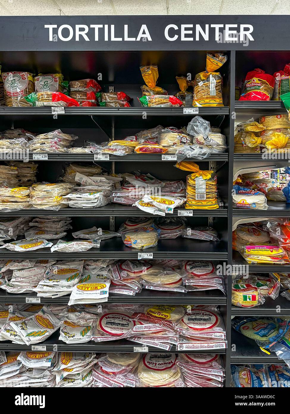 Various brands of tortillas in a grocery store Stock Photo