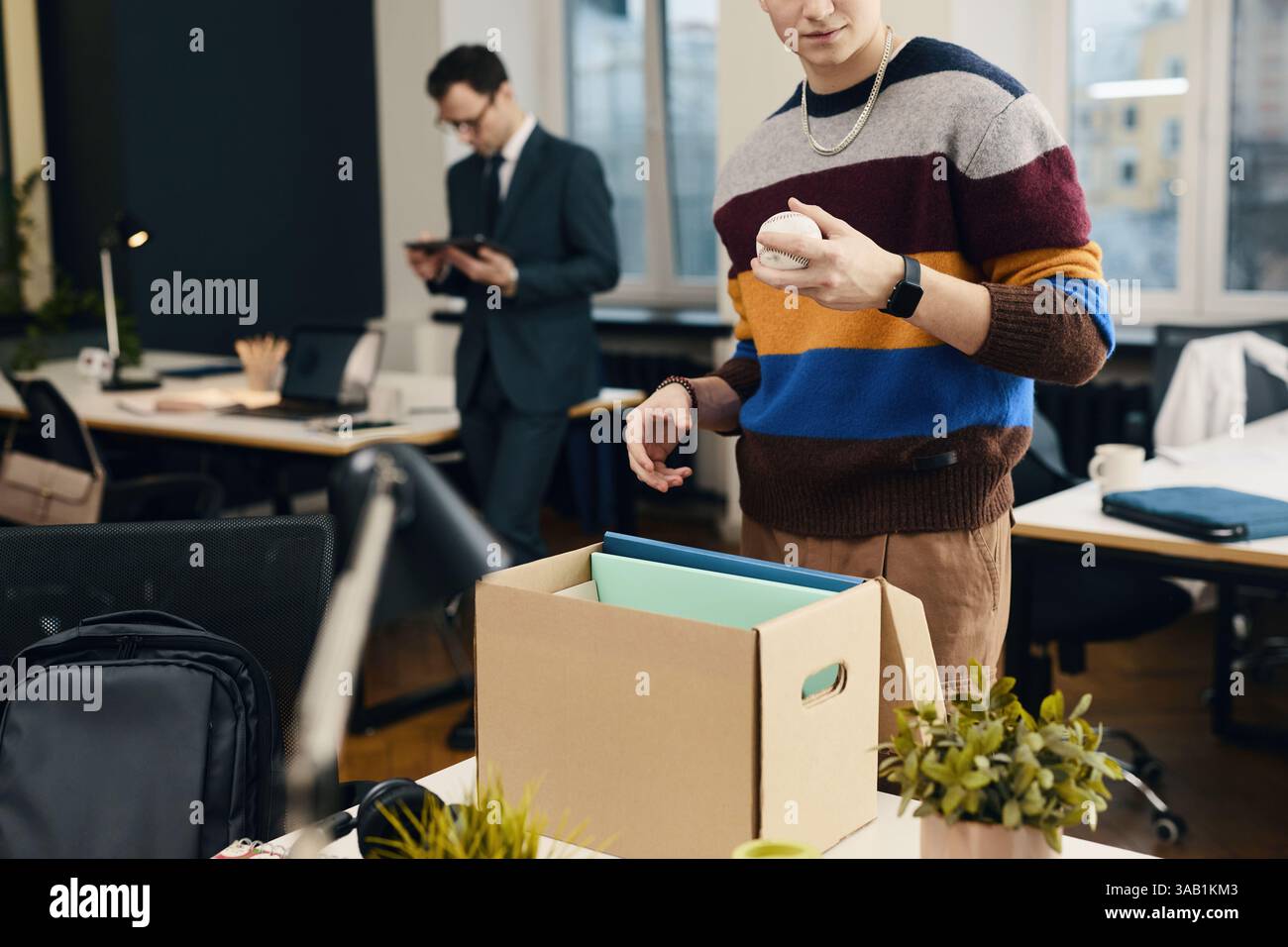 Unpicking Work Employee Unpacking His Things On New Workplace Stock Photo - Alamy