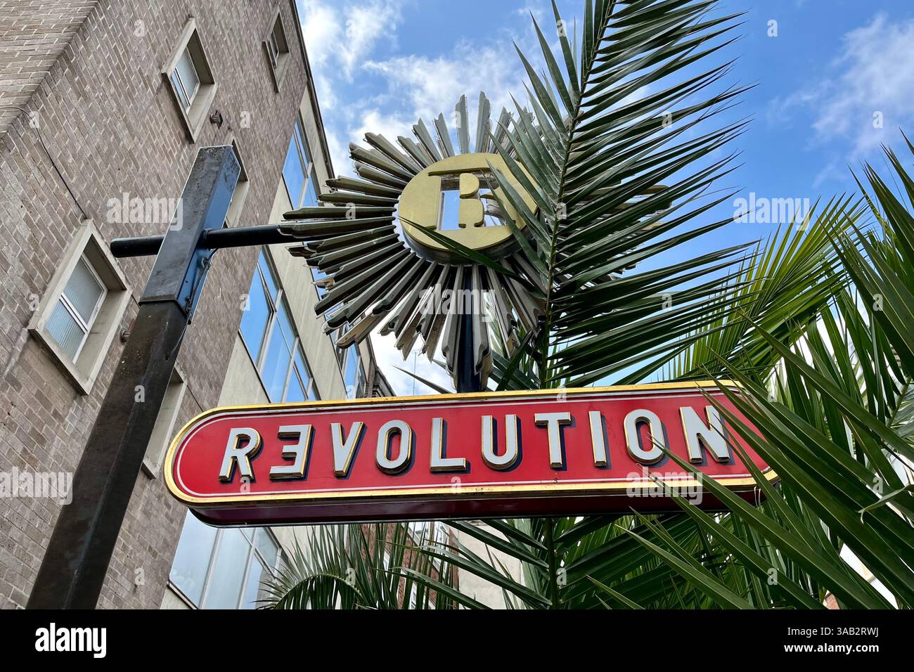 Revolution Bar Sign. Bristol, England, United Kingdom. 26th March 2025. - Smartphone Captured Stock Image