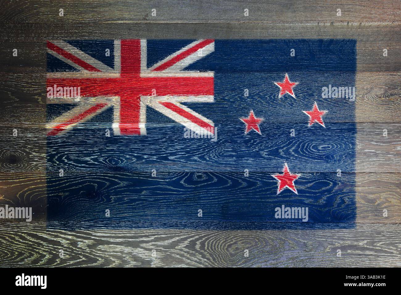 New Zealand flag on rustic old wood surface background Stock Photo - Alamy