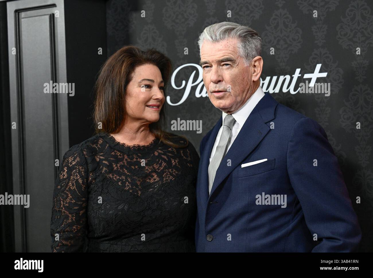 Pierce Brosnan, right, and wife Keely Shaye Smith attend the Paramount+