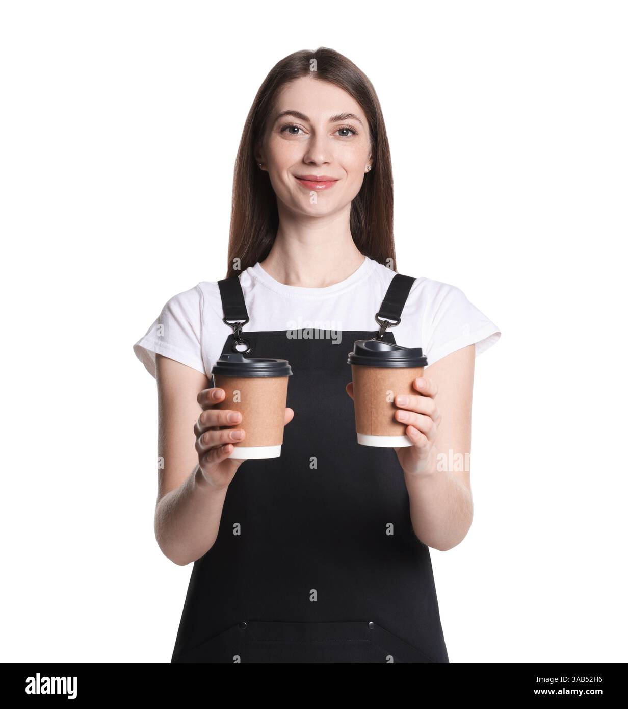Portrait of barista with paper takeaway cups of hot drink on white ...