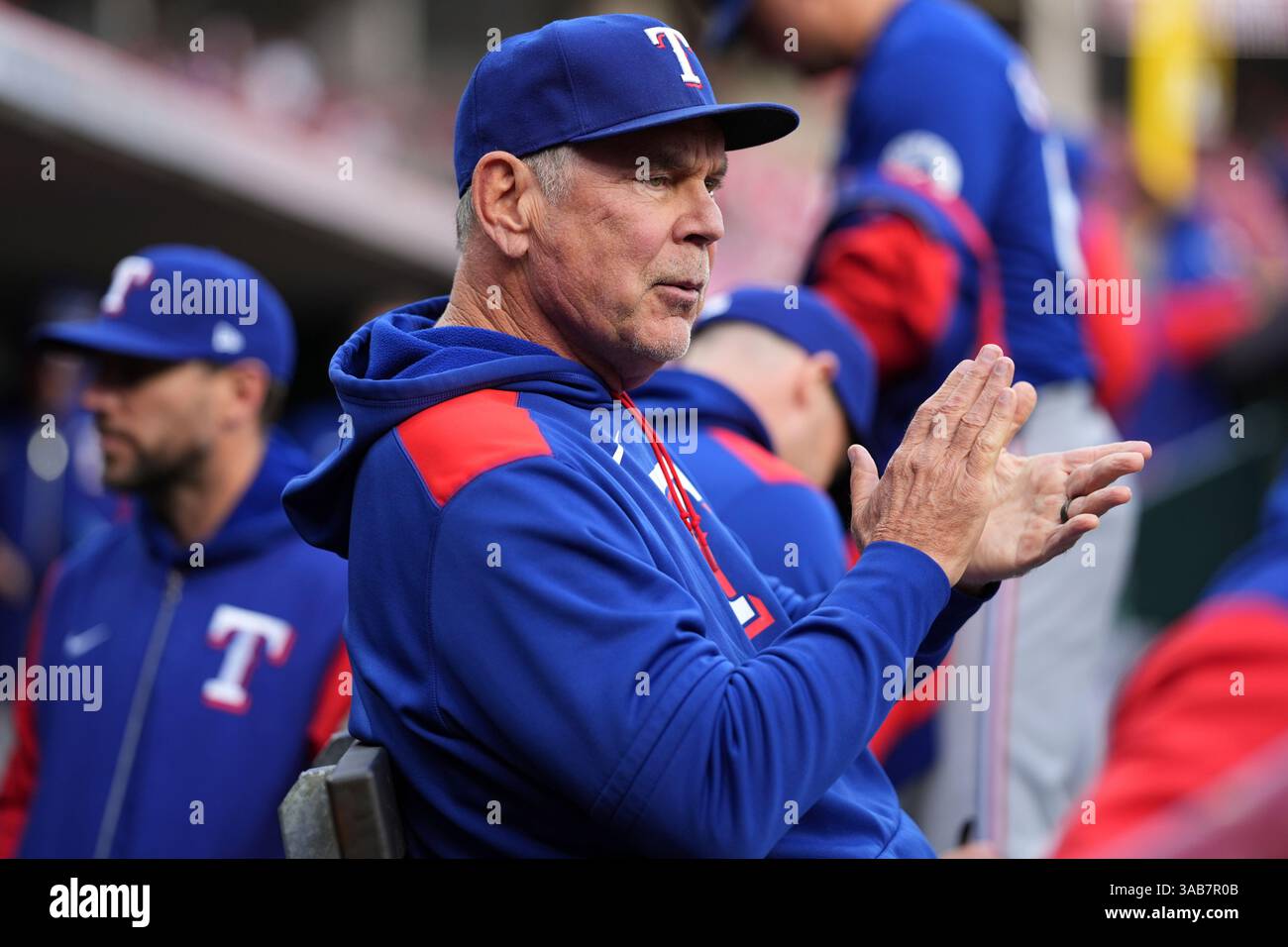 Texas Rangers manager Bruce Bochy encourages his team in the third ...