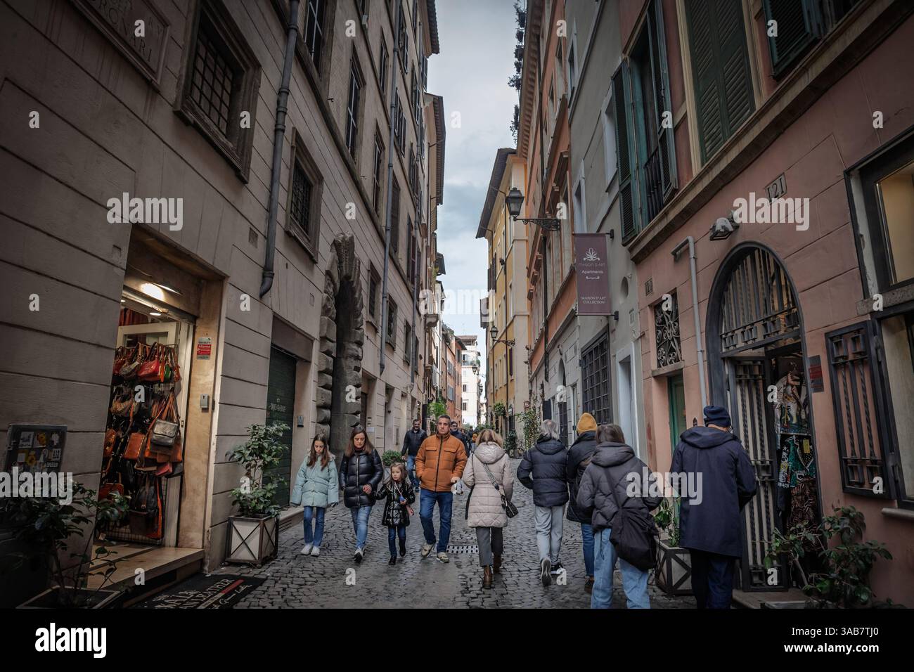 Cobblestone Walk Rome Narrow street in rome pedestrians hi-res stock photography and images ...