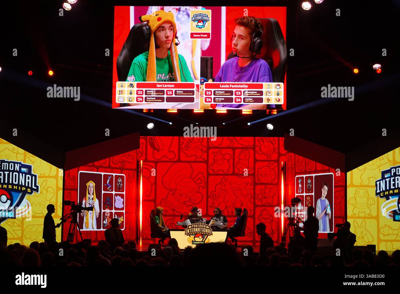 Competitors are seen on the stage for the final round of Pokemon ...
