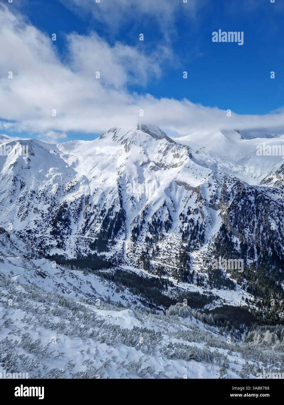 Wonderful Pirin mountains peaks covered with snow. Winter scene at Bansko ski resort in Bulgaria - Smartphone Captured Stock Image
