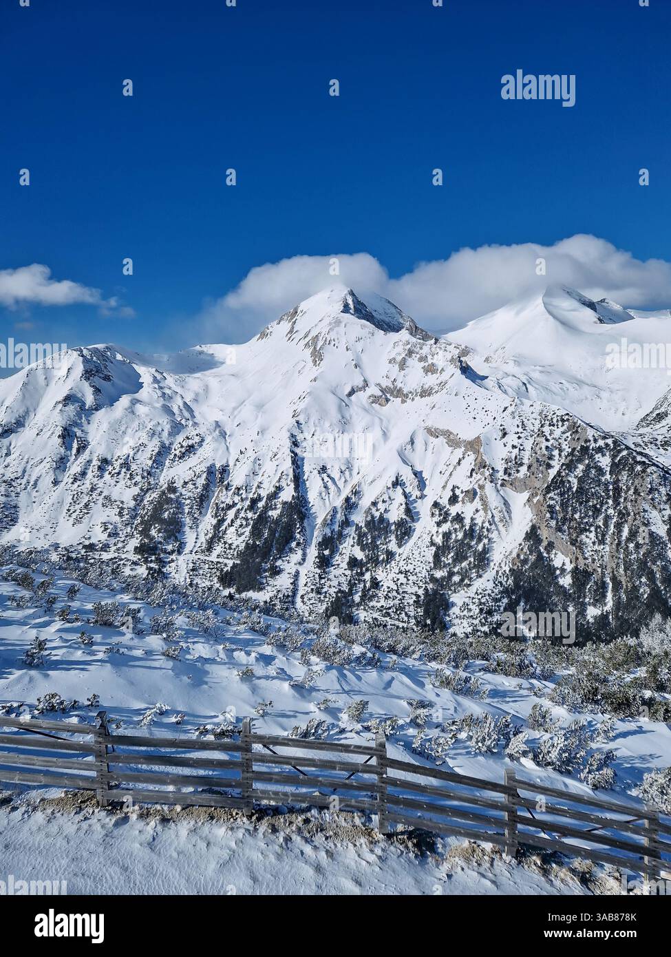 Wonderful Pirin mountains peaks covered with snow. Winter view at Bansko ski resort in Bulgaria - Smartphone Captured Stock Image