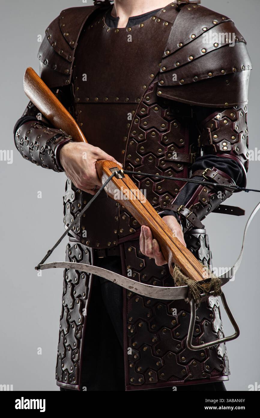 Warrior in Full Leather Armor Holding