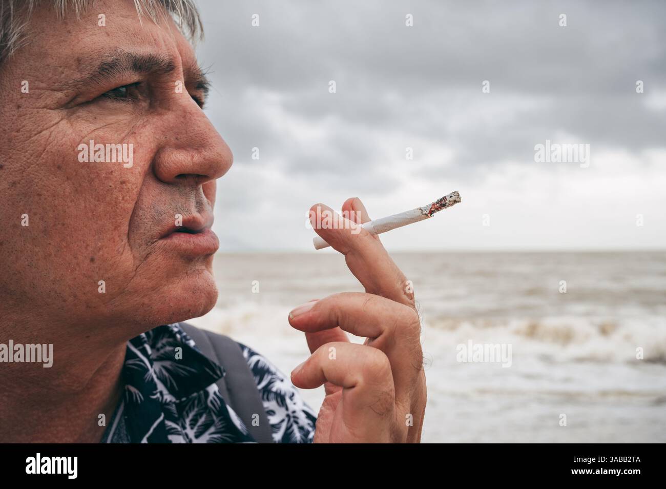 cigarette sad Sad person smoking hi-res stock photography and images