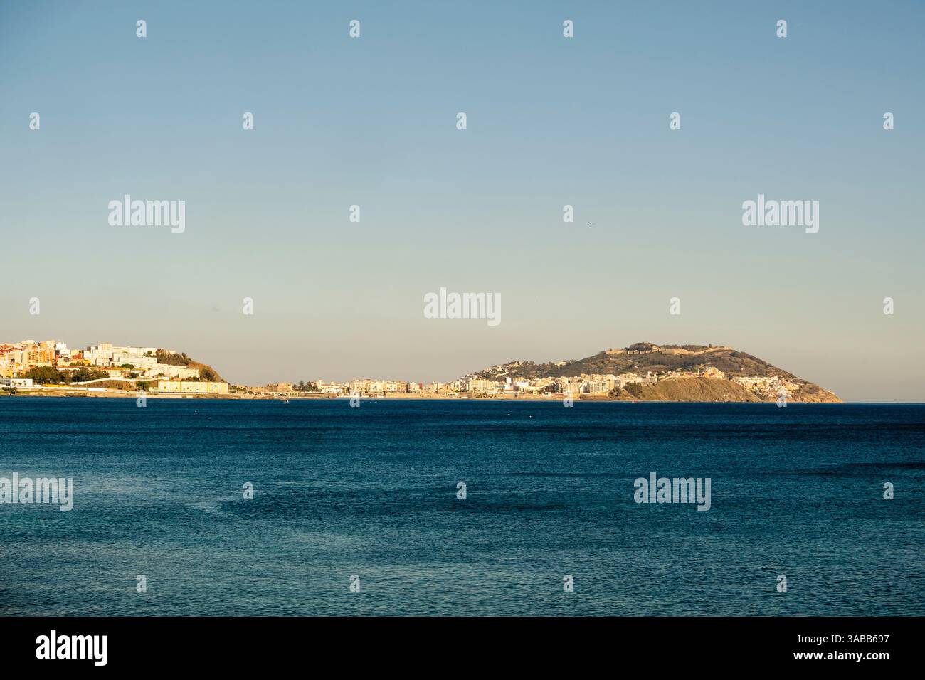 Beautiful view from Moroccan Fnideq to Spanish Ceuta on a sunny day, Morocco, Africa Stock Photo