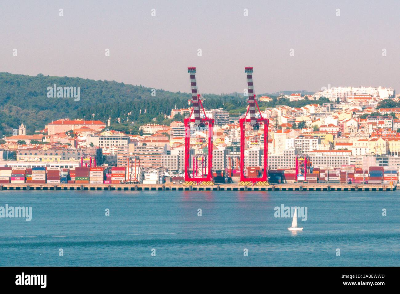Port of Lisbon, Lisbon, Portugal - October 23, 2024 - Panamax cranes and an open berth at the Port of Lisbon on the Tagus River Stock Photo